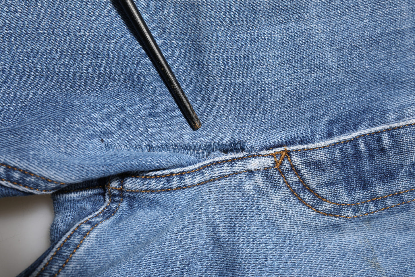 Blue Washed Tattered Logo Plaque Denim Jeans